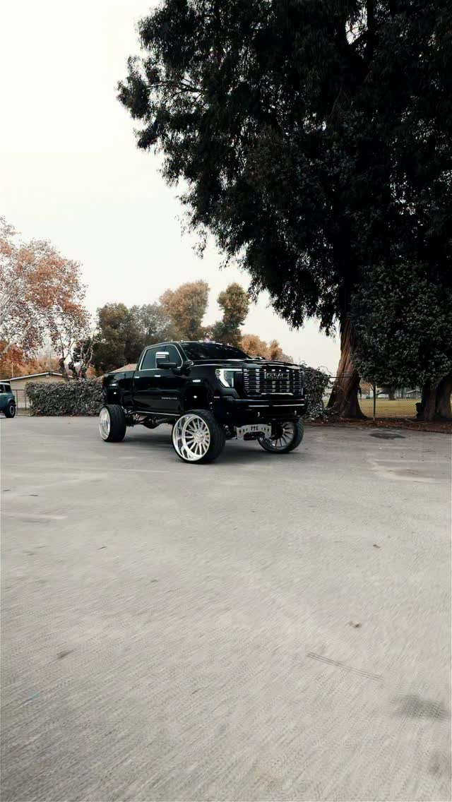 Lifted GMC Denali stance shot with 26 inch forged wheels